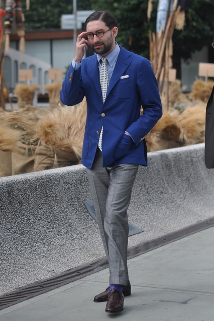 Blue jacket and grey trousers -